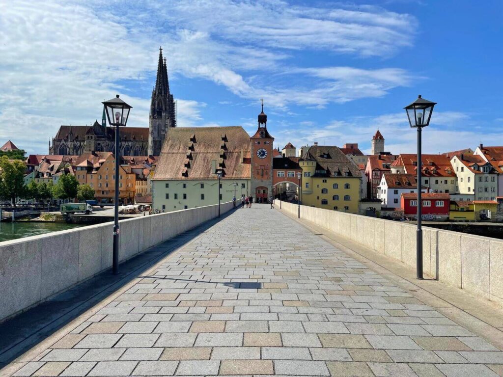 Old stone bridge over the Donau River in Regensburg, Germany